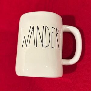 White Ceramic Mug with 'WANDER' Text